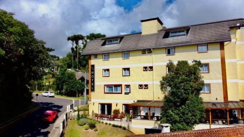 Canela Hotel | Golden Hills - Catedral
