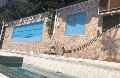 Peninsula Apartment | Guarujá: A viewpoint overlooking the open sea, with views of Ilhabela and Alcatrazes.