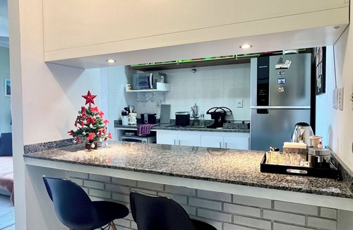Arroio Teixeira Apartment | Home office with pool and barbecue in Capão Novo - RS