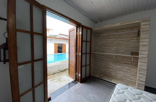 Balneario Praia do Pernambuco House | House for 10 guests, 300 meters from the beach in Guarujá-SP.