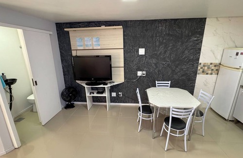 Tramandai Apartment | House with 2 suites, 1 parking space, barbecue, close to the sea.