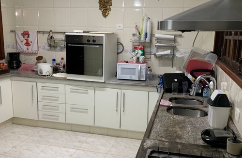 Pereque House | House with pool in a gated community in Guarujá, 3 minutes from the beach.