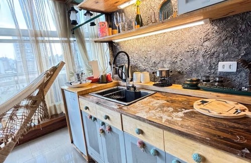 Central Zone Apartment | Java Themed Loft. With a spectacular view.