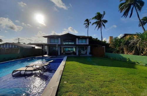 Porto de Galinhas House | Jewel of Porto, designer house, right on the sand with the comfort you need.