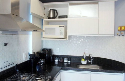 Manguinhos Apartment | Modern loft 5 minutes from Geribá with a balcony, grill, and pool—pets welcome!