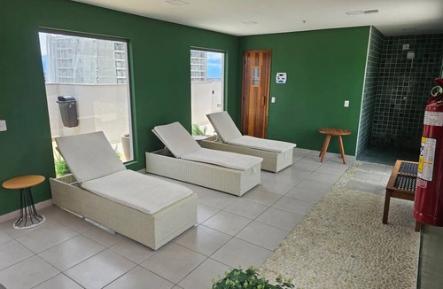 Santo Cristo Apartment | Modern studio apartment with ocean view, pool, and leisure facilities.