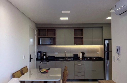 Matriz Apartment | Modern studio apartment in the city center with air conditioning, garage, swimming pool, and gym.