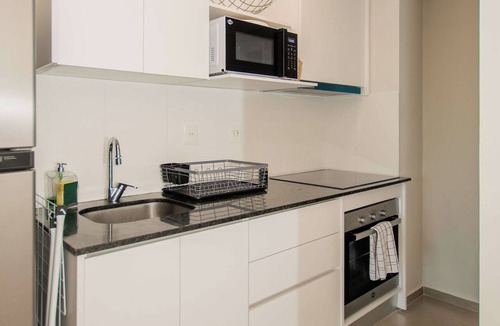 Luque Apartment | Modern Two-Bedroom in Luque with Pool&Gym Access