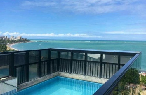 Pajucara Apartment | NA BEIRA MAR DE PAJUCARA- EDIF NEO- APARTAMENTO QUARTO E SALA - POSSUI VARANDA- VISTA LATERAL DO MAR-RUA JULIO PLECH FILHO 60 ESQUINA COM AVENIDA DOUTOR ANTONIO GOUVEIA - CONSUMO ELETRICO É PAGO No CKECK-OUT - 1 KWH É 1,35 REIAS - TEM TELA DE PROTEÇÃO