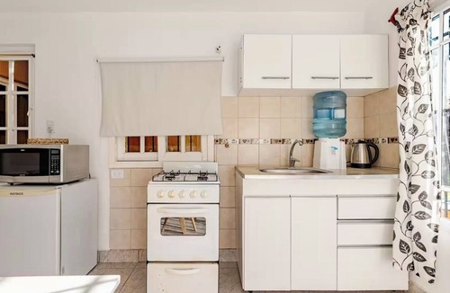La Union Apartment | Pool and barbecue area, sleeps 5, 20 min from Ezeiza Airport.