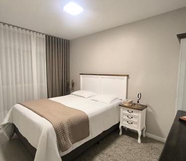 Kobrasol House | Quarto com Suite Privativo