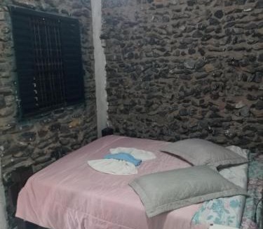 Morada do Ouro Apartment | Quarto de Pedra