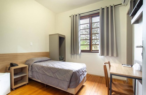 Nossa Senhora de Lourdes Hotel | Quiet & Relaxing Room Near Santa Maria Attractions | Free Breakfast & Parking