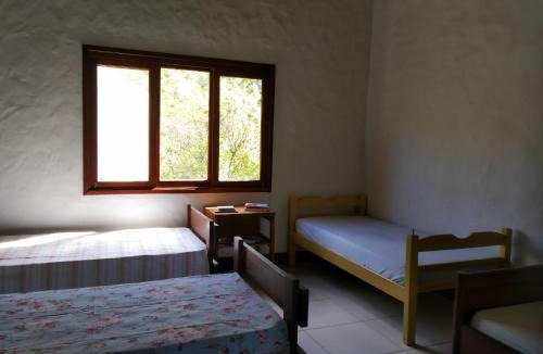 Passa Vinte House | Refúgio Caminho dos Ipês
