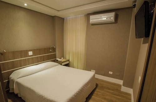 Civic Center Hotel | Relax in Double Bed w/Breakfast Included