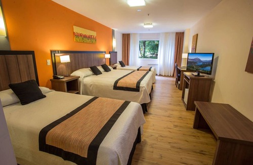 San Carlos de Bariloche Hotel | Relax & Recharge: 2 Family-Friendly Room w/Natural Views, Game Room & Breakfast