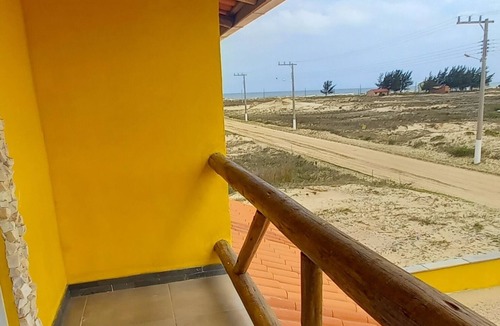 Jaguaruna House | Rust Stone House with Balcony, Hammock and Sea View - 180m from the beach