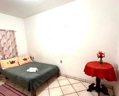 Centro Hostel | Seu cantinho na praia quarto privativo em Imbituba