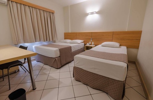 Umuarama Hotel | Simple Yet Practical Room l Close Orlando de Carvalho Airport - 3.1 miles