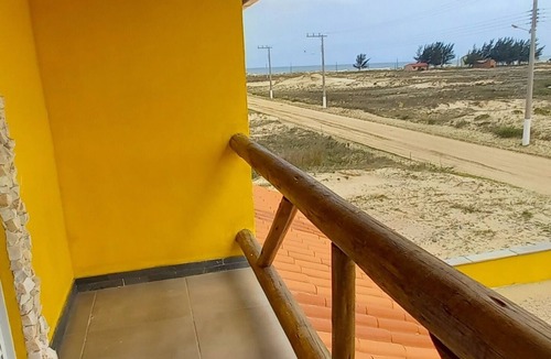Jaguaruna House | Slate stone house with balcony, 180m from the beach.