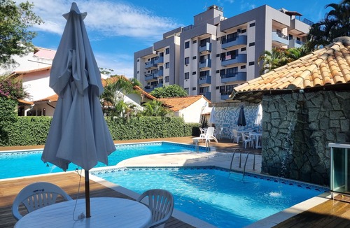 Braga Apartment | Spacious apartment 5 minutes from Praia do Forte beach, with parking space and swimming pool.