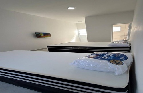 Jardim Rio da Praia Apartment | Studio apartment 5 minutes from Sesc beach in Bertioga-SP. Ideal for 3 people.