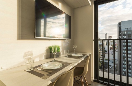 Auxiliadora Apartment | Studio Elegante e Conectado em Porto Alegre