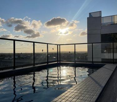 Intermares Apartment | Studio na praia Piscina, academia e lavanderia