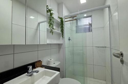 Edson Queiroz House | Studio with industrial style and dune view