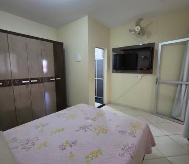 Piuma House | Suíte independente com cozinha e varanda