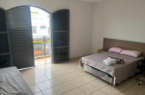 Centro House | Suite com Varanda - Cooworking Conexão Resolve