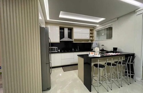 Nossa Senhora da Paz House | Two-story house with pool near beaches and Beto Carrero World theme park.