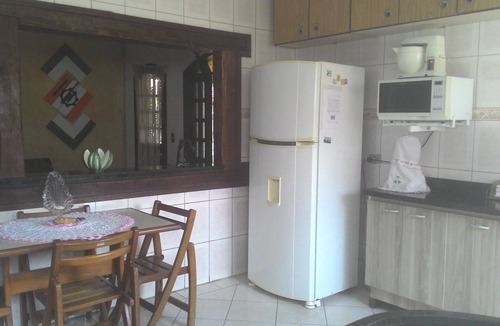 Sao Francisco da Praia House | Two-story house in São Sebastião with pool, games area, 5 bedrooms, sleeps 21.
