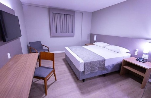 Centro Hotel | Warm & Inviting Room | 6-Min Walk to Iconic Carlos Gomes Theater - 0.3 Mi Away