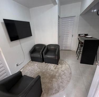 Apartamento térreo no Centro de Tramandaí, com ar condicionado, garagem e churrasqueira