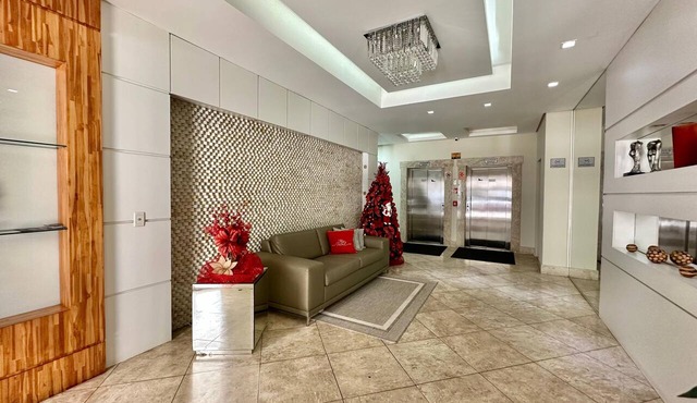 Apartment with a view of the beach, next to Luiz Bassani square.