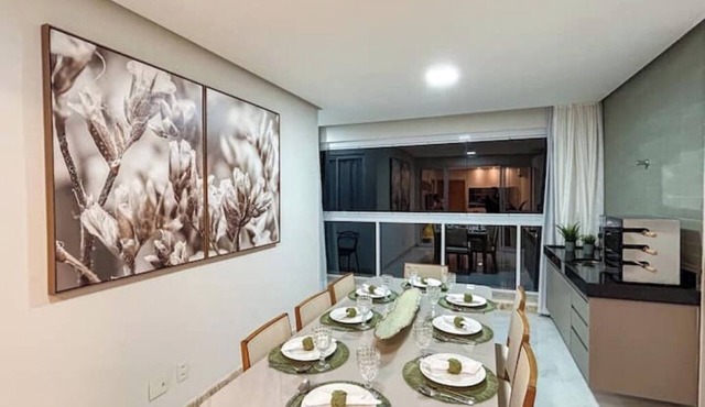 Beachfront apartment in Praia do Morro with air conditioning and barbecue.