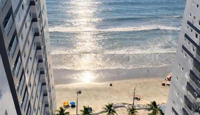 Beachfront apartment with pool for families, pets allowed.