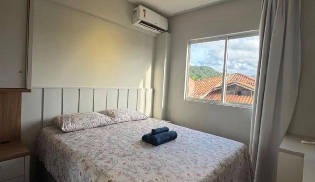 Beautiful and modern apartment, close to the beach, with marina and barbecue area.