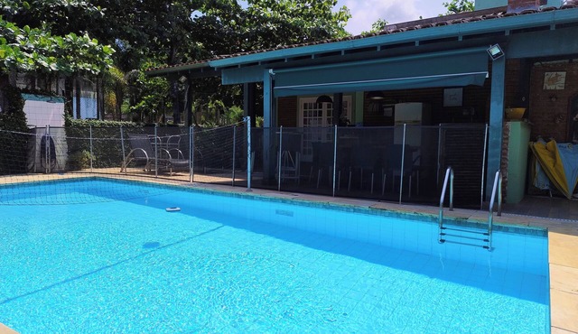 Casa Albamar – Swimming pool, barbecue, comfort and security surrounded by nature in Balneario Praia do Pernambuco Guarujá