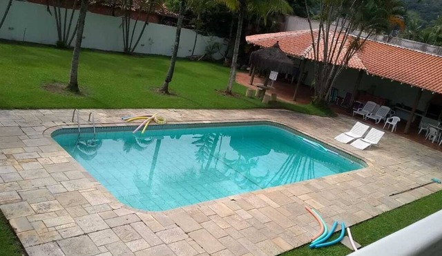 Casa 4 Suites- Piscina/churrasqueira, Wi-fi, Próximo à Praia de Pernambuco in Balneario Praia do Pernambuco