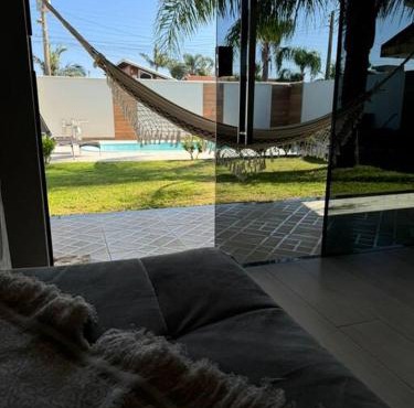 Casa aconchegante com piscina na praia