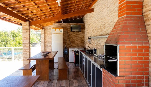 Casa bem equipada com piscina,churrasqueira e WiFi