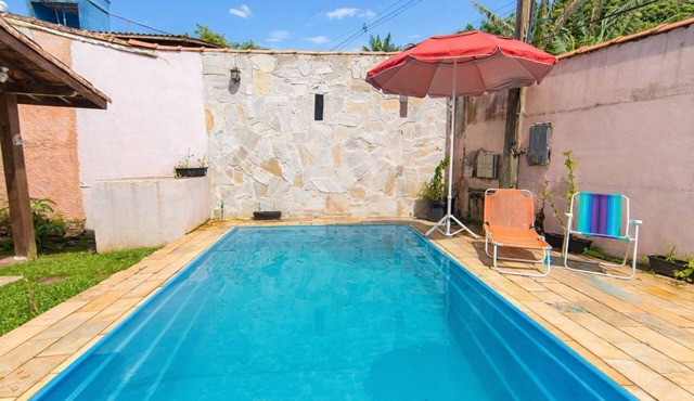 Casa com Piscina e Área Gourmet em Boiçucanga