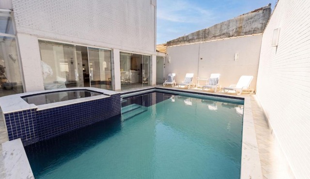 Casa com Piscina e Jacuzzi a 300m Praia da Enseada in Guarujá