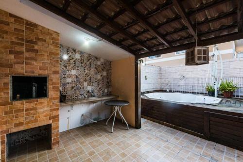 Casa de temporada com quintal interno in Palhoça