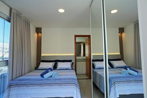 Cobertura Duplex no Campeche Florianópolis, 2 quartos com ar-condicionado, 3 banheiros, WiFi 1Gb, Cozinha completa, Estacionamento, Amplo terraço coberto com churrasqueira
