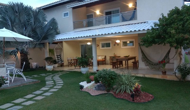 Comfortable 4-suite house in a great gated community with lots of greenery, beach and river. in Camaçari