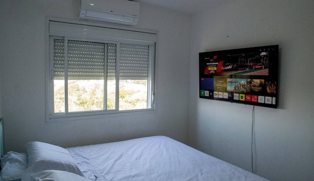 Cozy apartment next to the Grêmio arena, close to the airport.