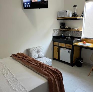Flat com ar e varanda com linda vista para o Ibituruna, Wi-Fi - Véu de Noiva 204 in Governador Valadares